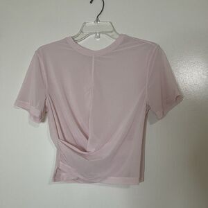 LULULEMON Baby pink mesh twist cropped workout top size 4